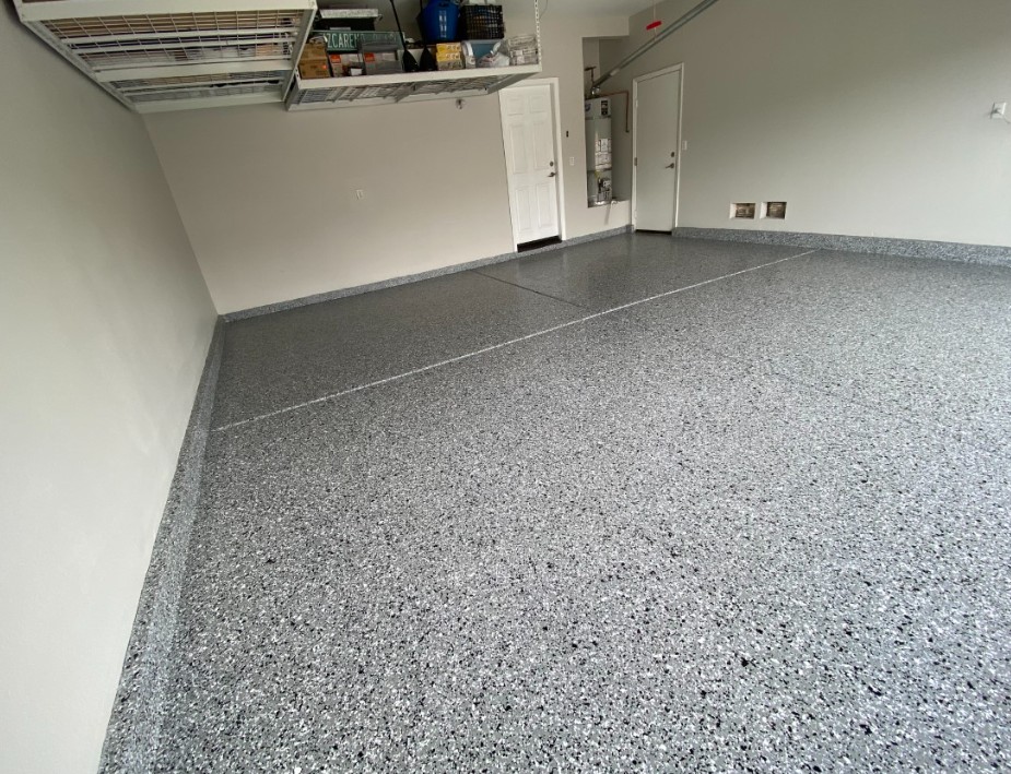 Flake epoxy garage floor installed in Little River SC — gray chip system by Bakerss Property Maintenance