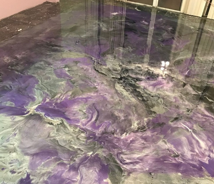 Metallic epoxy floor installed in Murrells Inlet SC — purple violet gray swirl by Bakerss Property Maintenance