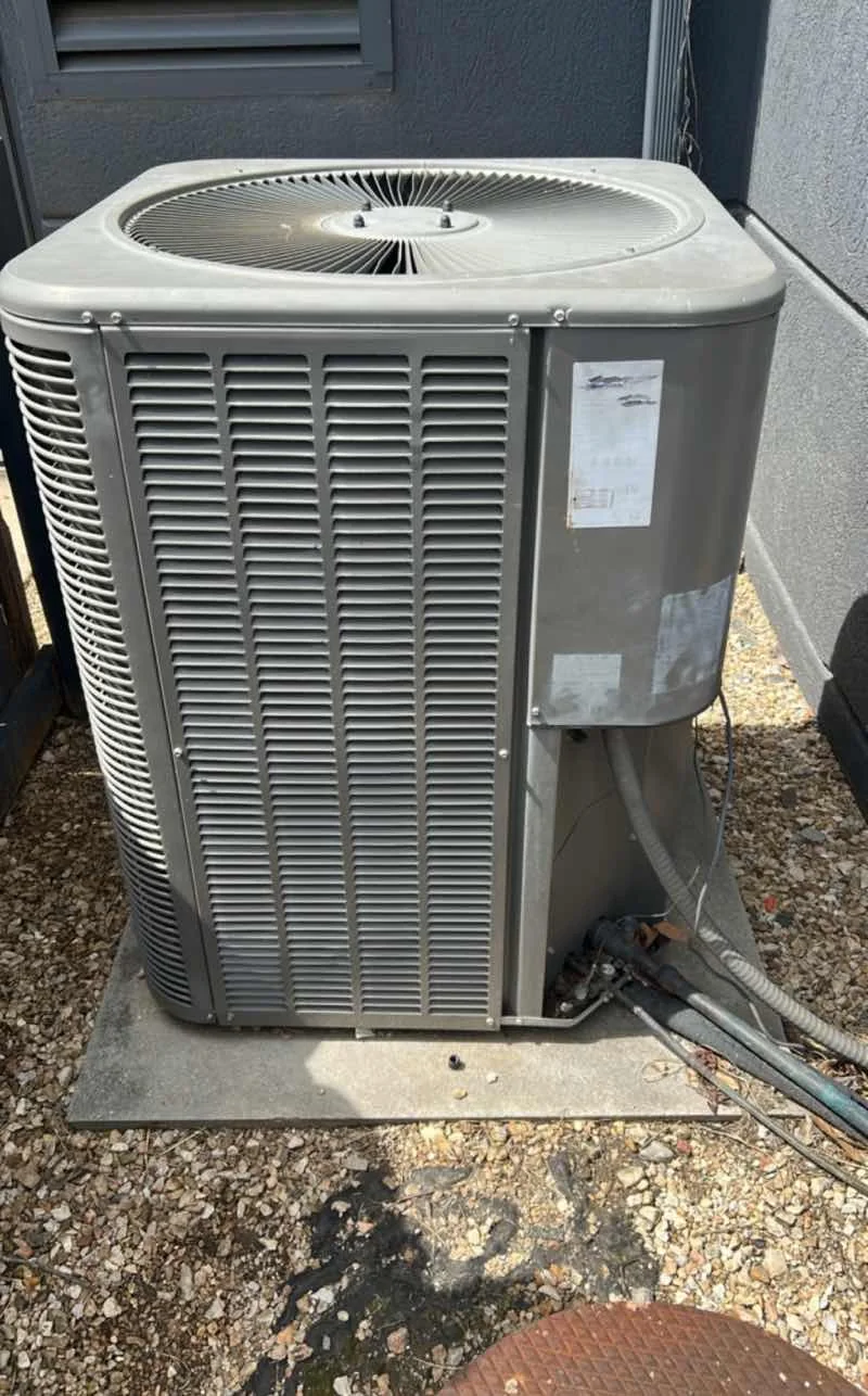 Outdoor HVAC unit during Bakerss service work