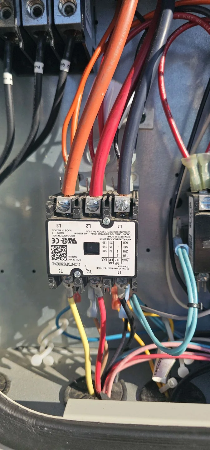 Electrical connections inside the equipment during Bakerss service work