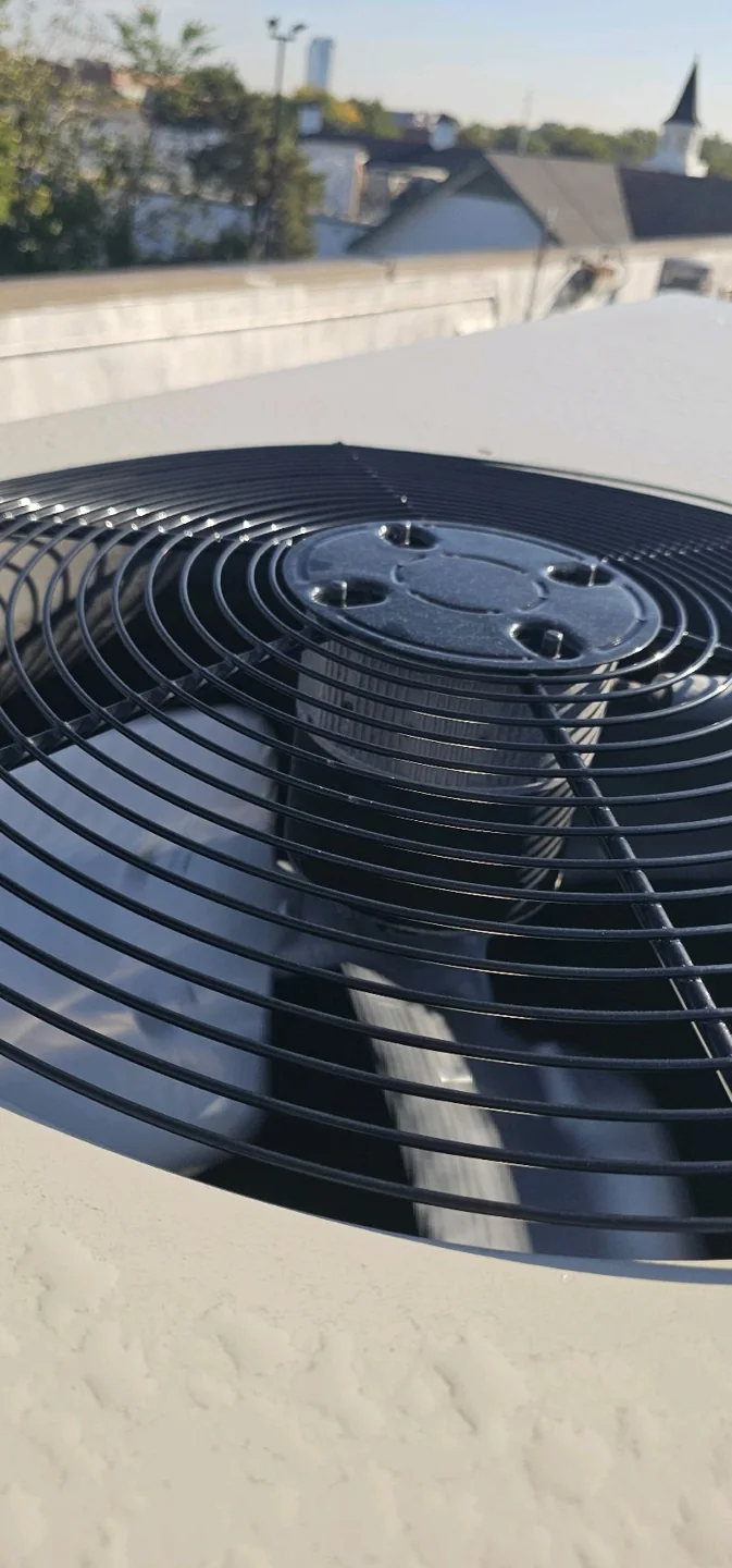 Outdoor fan and coil area during Bakerss service work