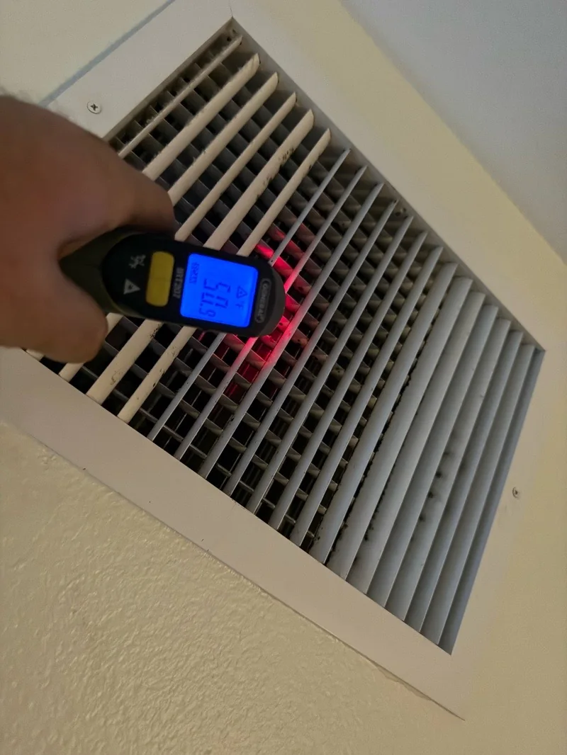 Instrument at ceiling grille in Conway