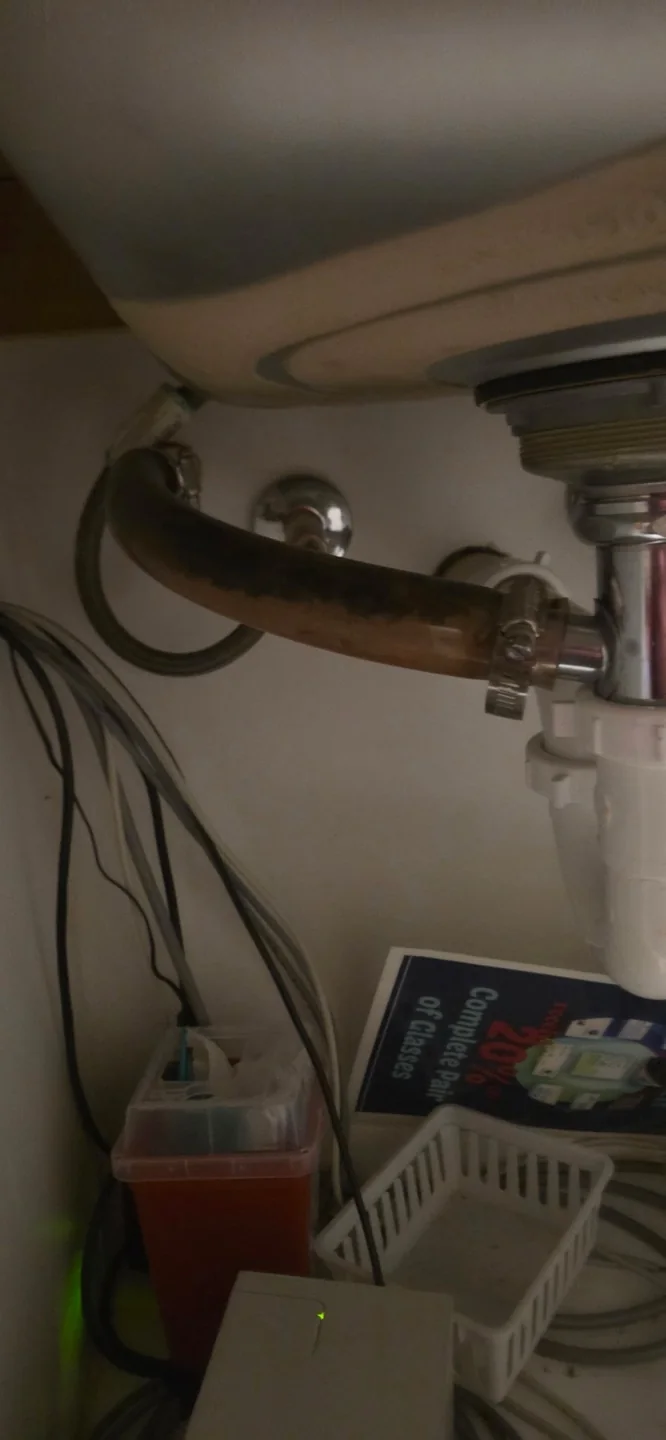 Under-sink plumbing and supply lines in Conway
