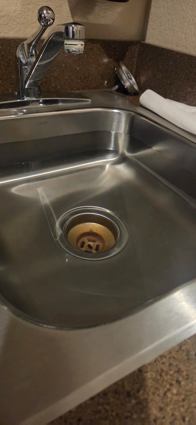 Sink basin and fixture in Conway