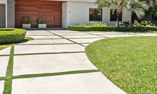 Modern home large-format pavers grass joints palm tree — Surfside Beach SC